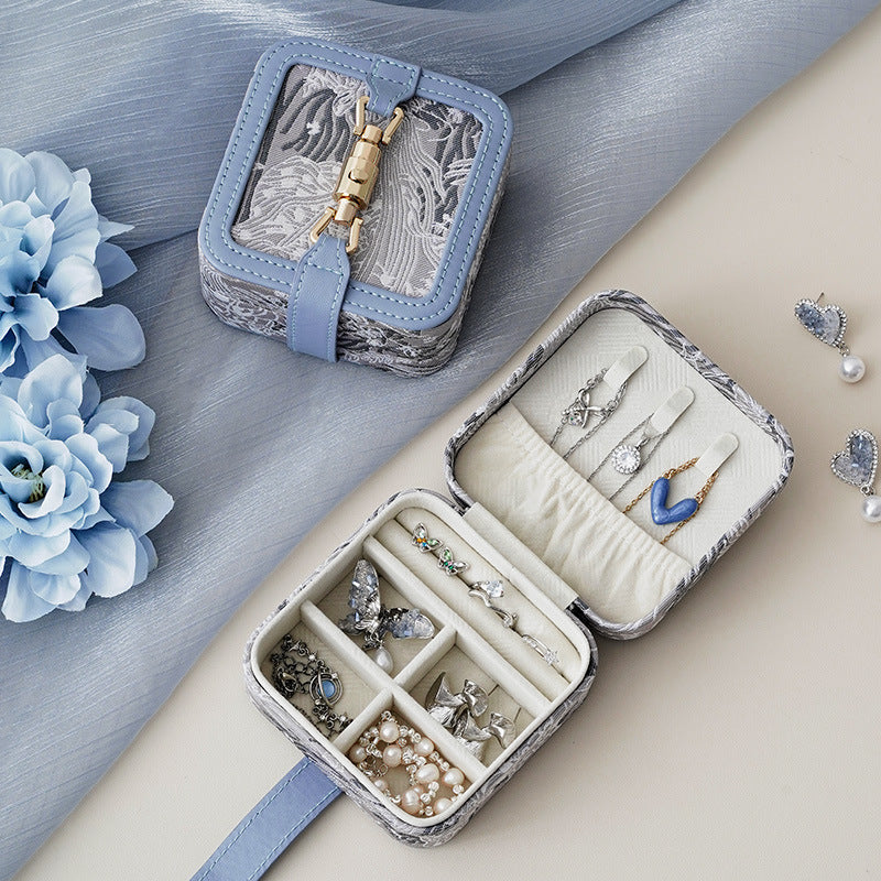 Blue Portable Vintage Embossed Jewelry Box - Flip-Top Necklace, Ring, and Earring Organizer with Elegant Design The Jewelry is a prop for the photo shoot and is not included