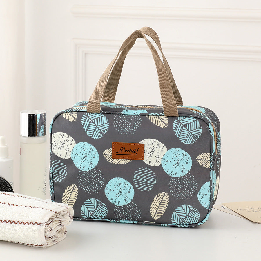 Versatile Portable Handled Bag - Durable Waterproof Fabric, Ideal for Toiletries, Lunch & Travel Leaves