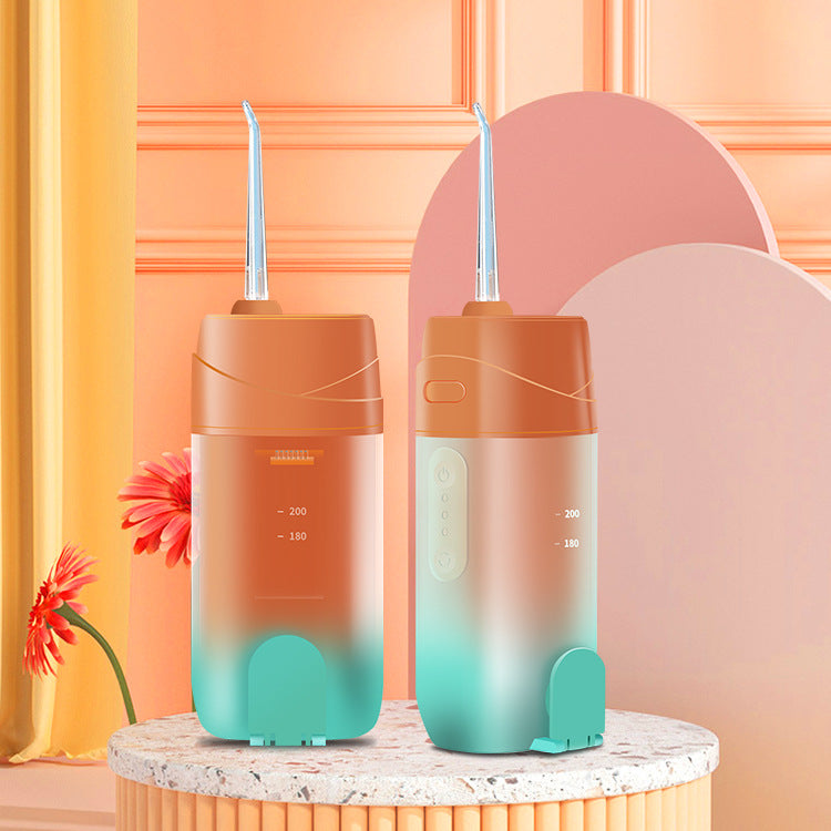 Orange And Green Smart Telescopic Portable Water Flosser - USB Rechargeable Oral Irrigator, IPX7 Waterproof, 3 Modes & 4 Nozzles