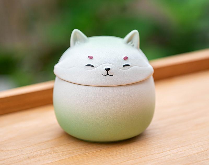 Artisan Ceramic Sealed Storage Jar with Animal Design - Airtight Tea Preservation & Decorative Accent light green