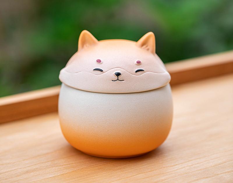 Artisan Ceramic Sealed Storage Jar with Animal Design - Airtight Tea Preservation & Decorative Accent Gradient Orange