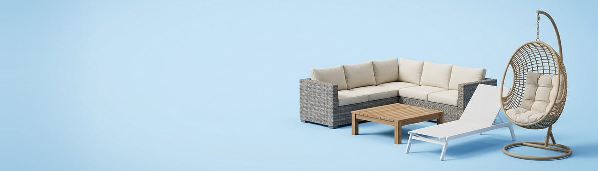 Outdoor furniture hero: wicker lounge, sun lounger and egg chair on sky blue