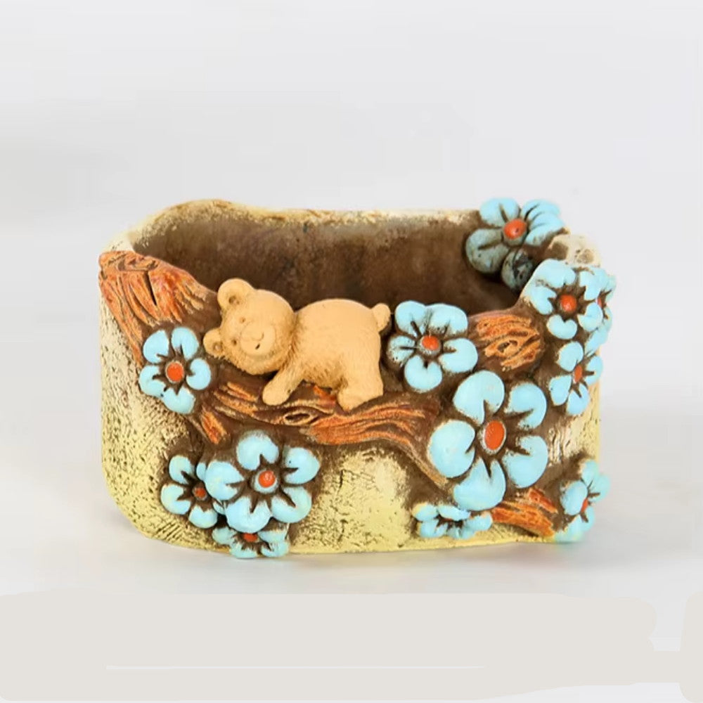 Cute, hand painted bear succulent pot. Random design