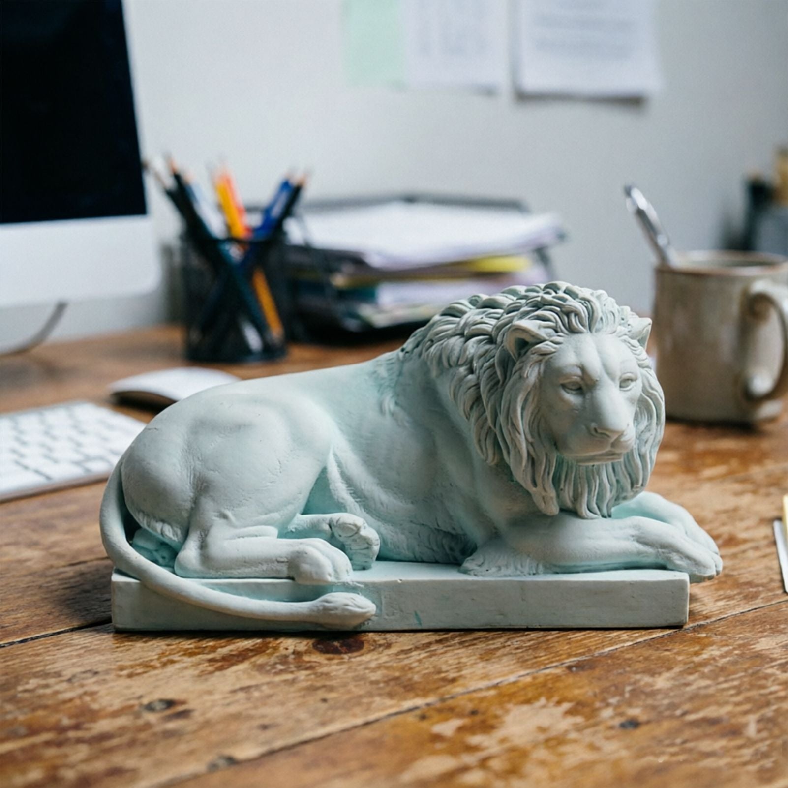 Classic Reclining Lion Sculpture Minimalist Green Plaster Desk Ornament for Living Room, Study, or Office Decoration