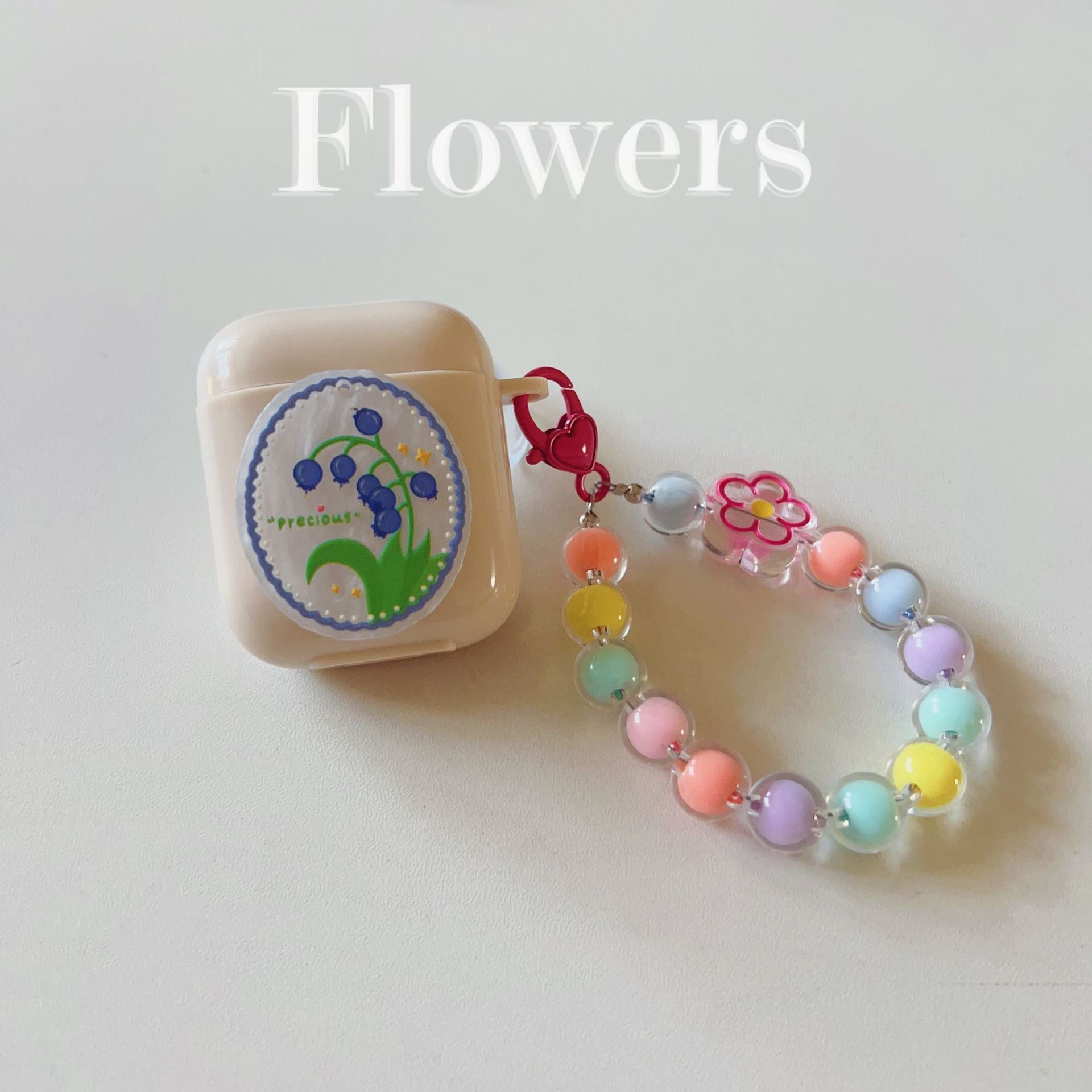 Floral Off-white AirPods 1/2 Case with Colorful Bracelet