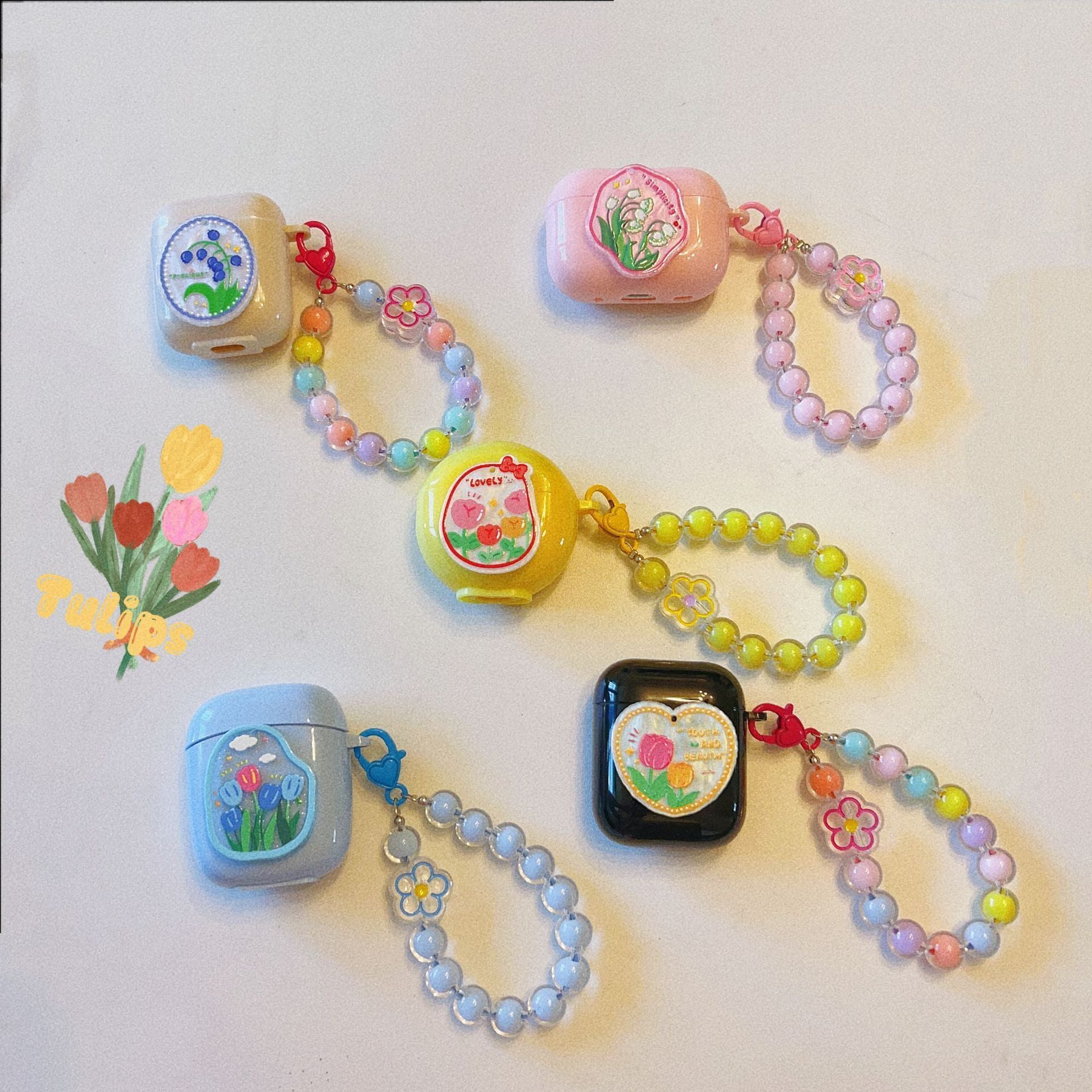 Floral patches + light blue base shell + blue bracelet AirPods 1/2