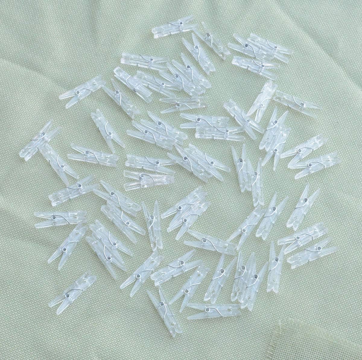 Yansanido 100pcs Mini Clear Plastic Utility Paper Clip, Clothespins Clips, Clothes Line String Clips, mini Clothes Pins for Photo for String Fairy Lights Color Clear 100pcs Clear Plastic Clips