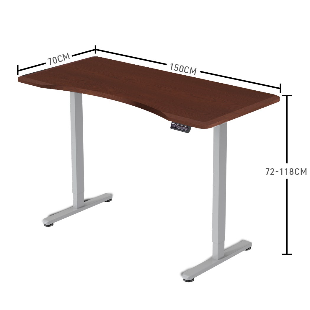 FORTIA Sit To Stand Up Standing Desk, 150x68cm, 72-118cm Electric Height Adjustable, Ergonomically Curved Edge, 50kg Rated, Walnut Style/Silver Frame