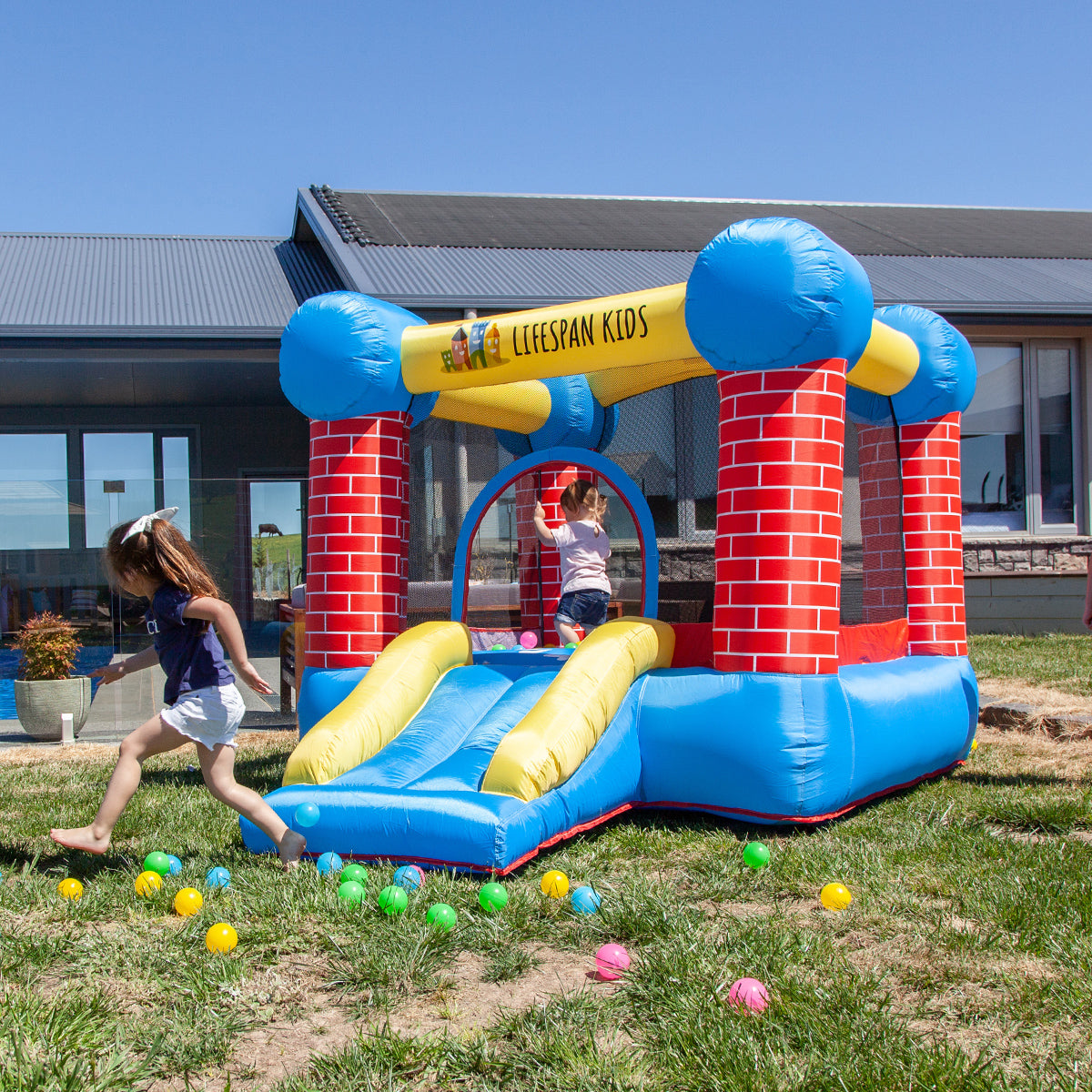 Durable Jumping Castle with Slide & Hoop - Lifespan Kids