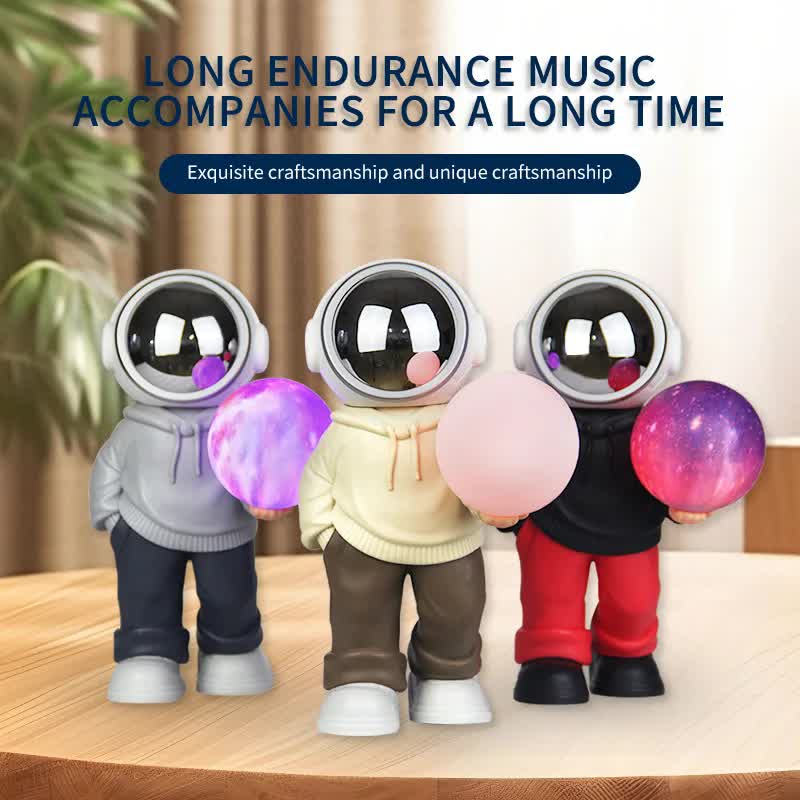 Holding a dreamy starry sky beige top + brown pants Creative Astronaut Bluetooth Speaker with 3D Starry Sky Lighting, Portable Wireless Moon Lamp Speaker -Perfect Gift for Space Enthusiasts