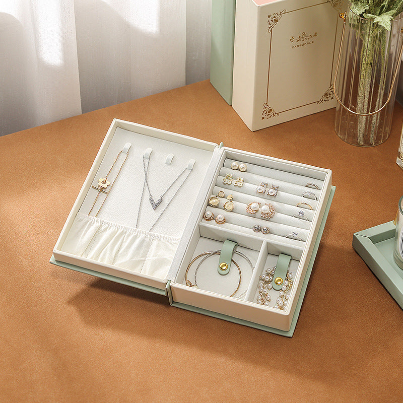 Light Green Creative PU Jewelry Storage Book - Magnetic Closure Organizer for Earrings, Rings, and Necklaces The Jewelry is a prop for the photo shoot and is not included