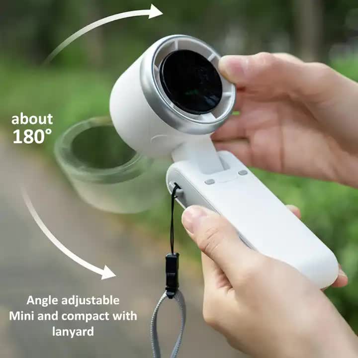 White Compact and Foldable Mini Projector - Portable and Versatile for Home and Office Use