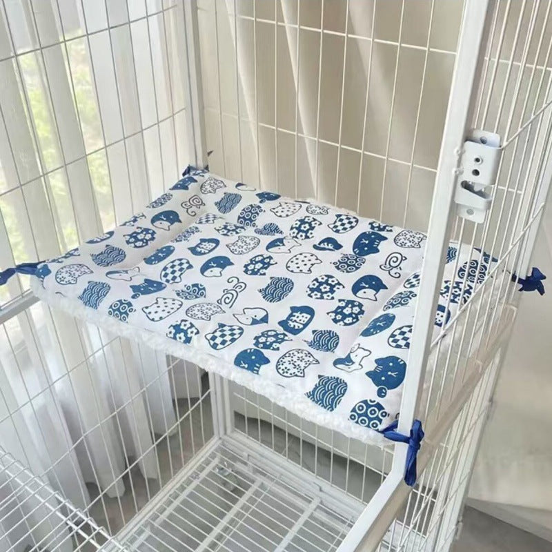 Tie-On Cat Cage Platform Pad - Blue cat pattern on white background 30x75cm