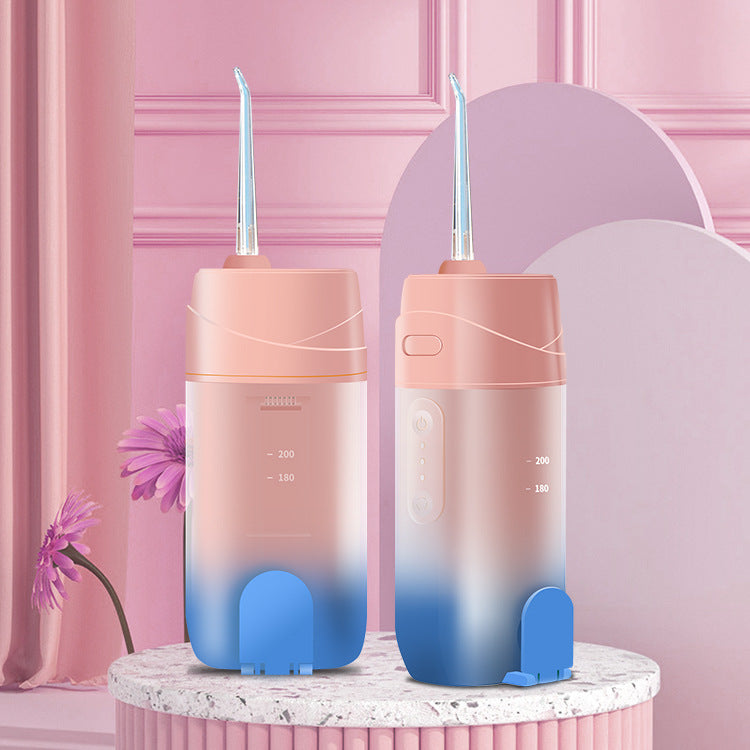 Pink And Blue Smart Telescopic Portable Water Flosser - USB Rechargeable Oral Irrigator, IPX7 Waterproof, 3 Modes & 4 Nozzles