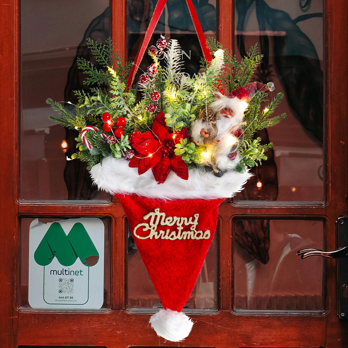 Illuminated Santa Hat Door Hanger with Holiday Greenery & Berries - Christmas Wall Decor red